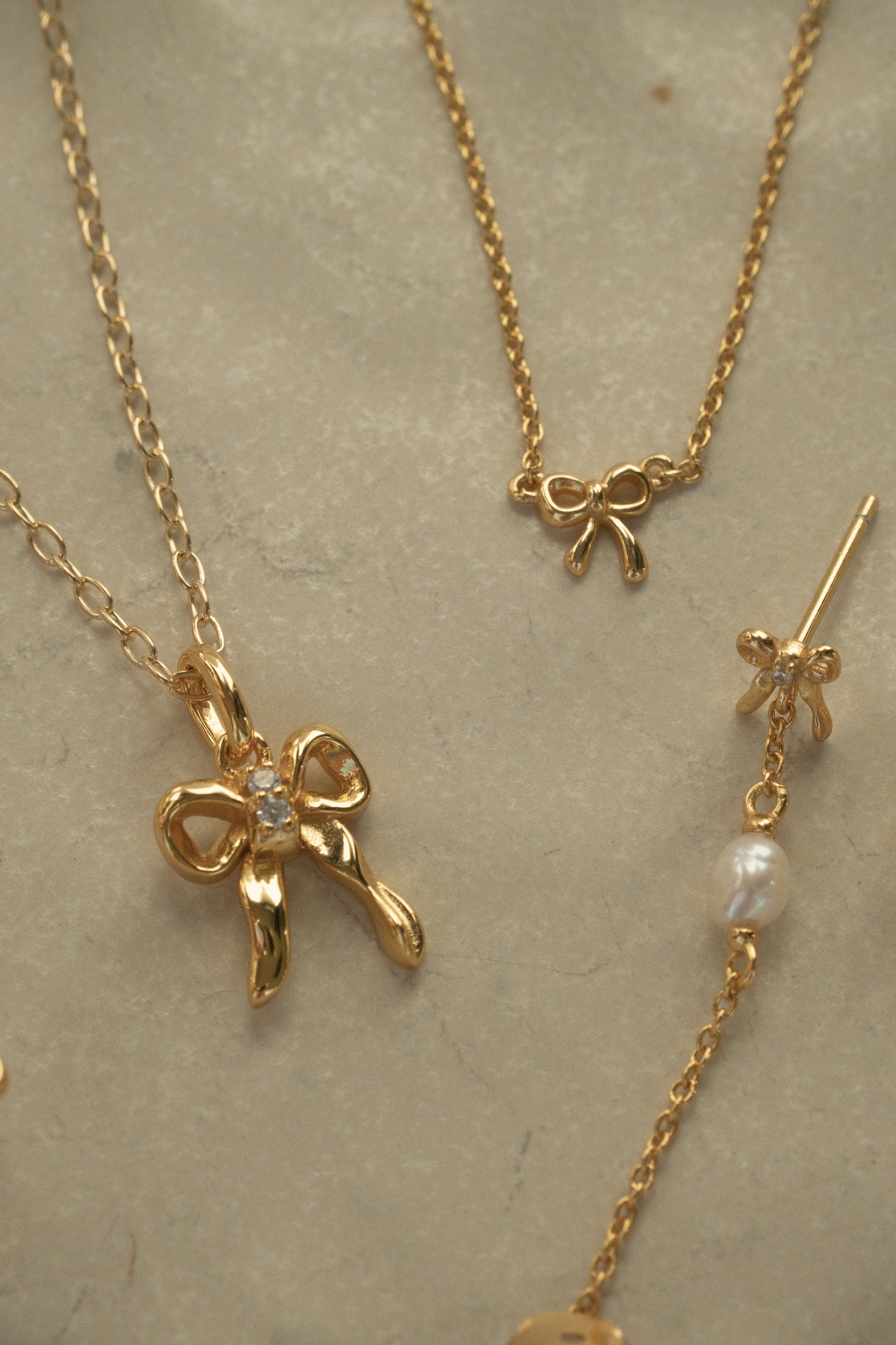 Solid Gold Bow Pearl Drop Stud - Image 2